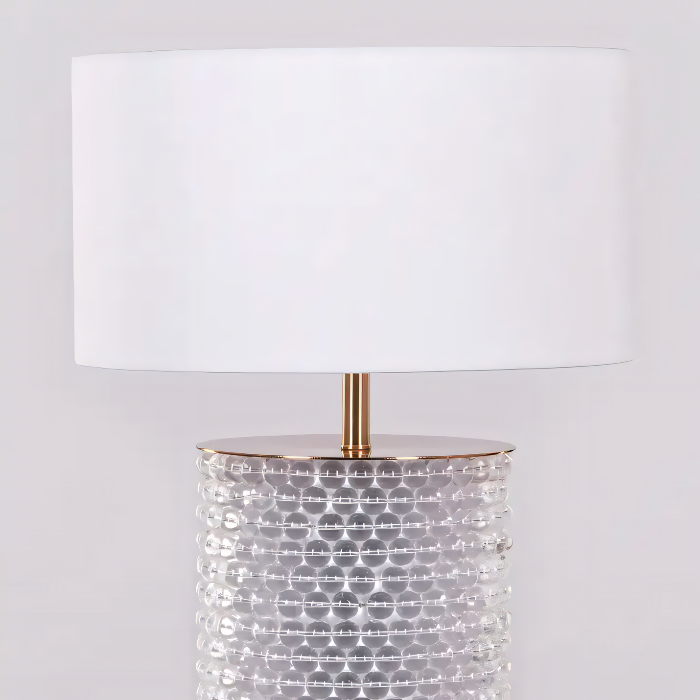 Close-up of the Well Heeled (White, Gold) Table Lamp's elegant and refined design details