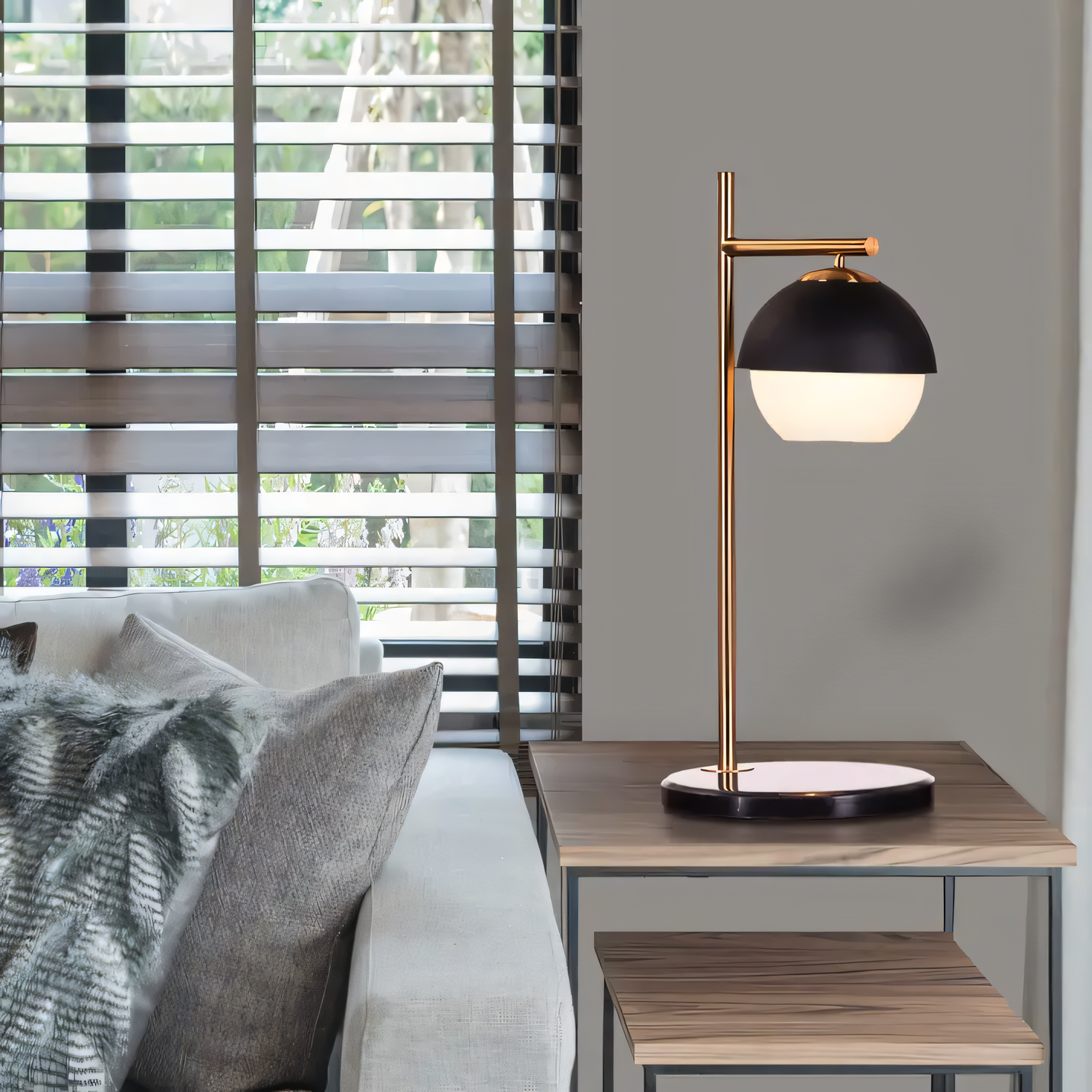 Gold matte metal frame table lamp with black marble base