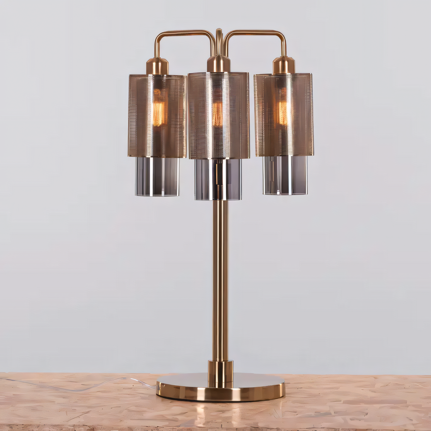 Attention Seeker (Gold) Table Lamp on a console table in an entryway, making a statement