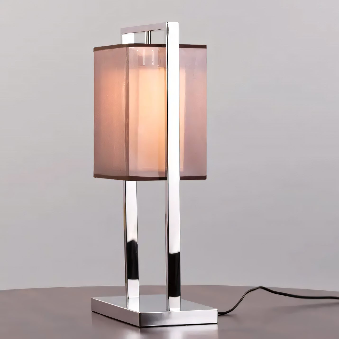 Rose taupe fabric shade of the Silent Treatment Chrome Table Lamp