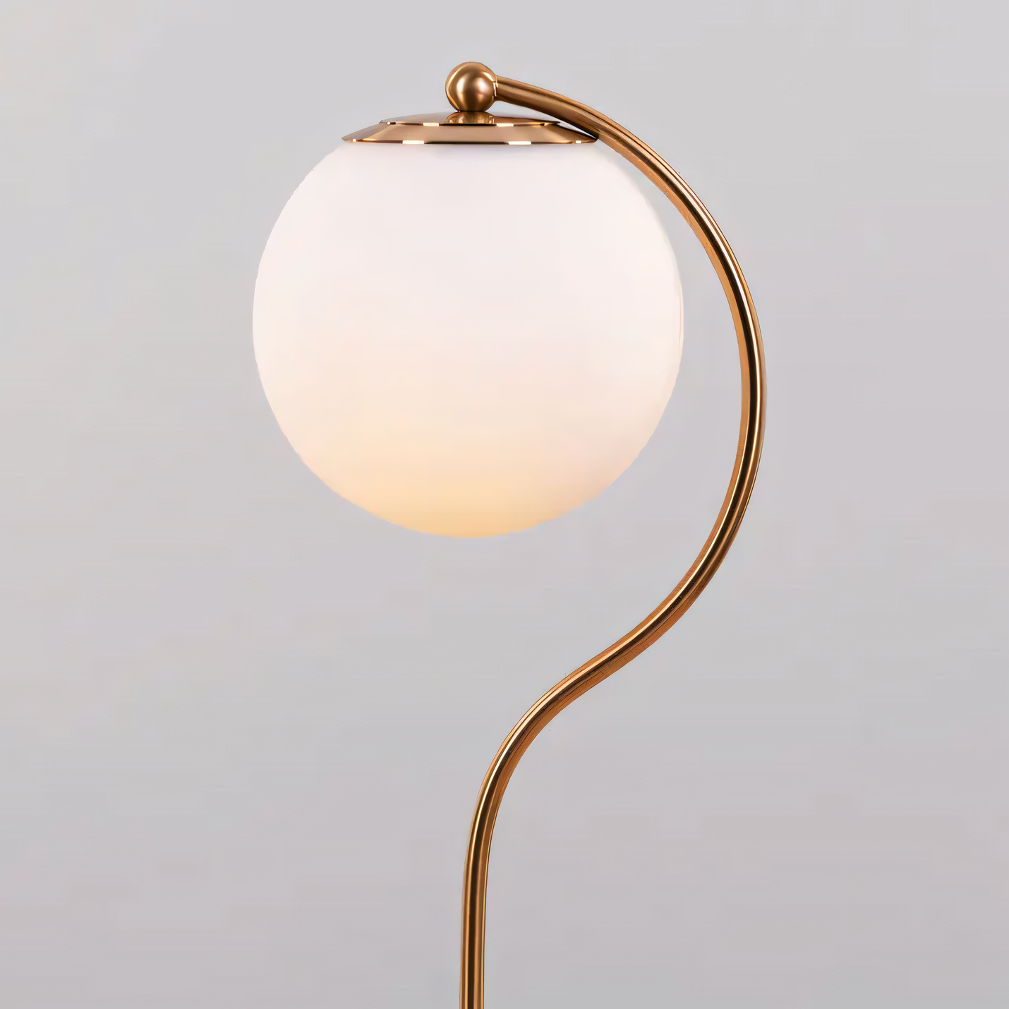 Marble and metal table lamp with curved neck and glass goblet