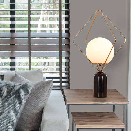 Black marble base with matte gold metal frame table lamp