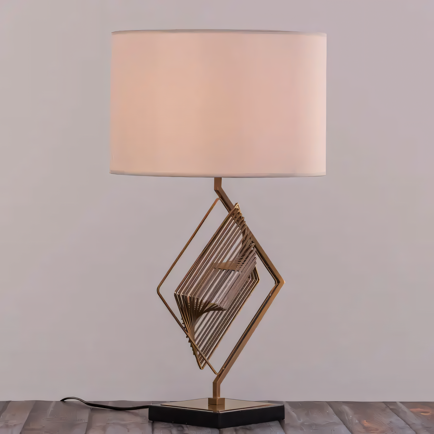 Luxurious matte gold finish of the Stepping Stone Lamp's metal body