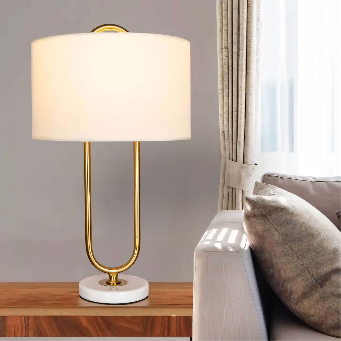 Marble and gold table lamp with hairpin-inspired design