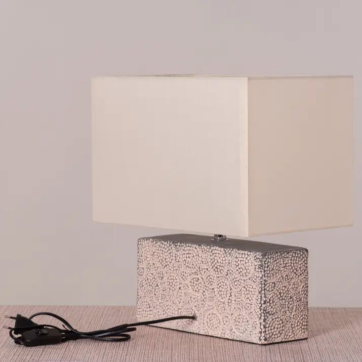 Handcrafted ceramic lamp with organic textures