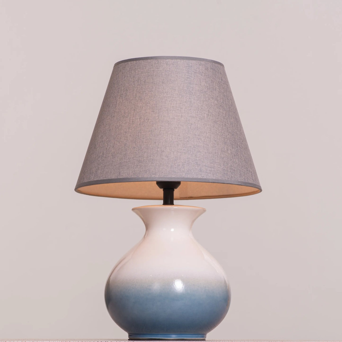 Calming blue and white ceramic table lamp for bedroom