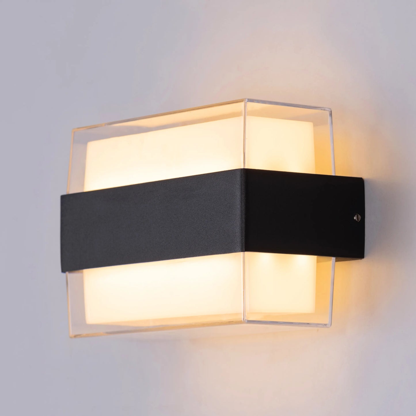 Wonder Indoor/Outdoor Wall Light with IP65 rating, featuring a sleek modern design and energy-efficient illumination for versatile use.