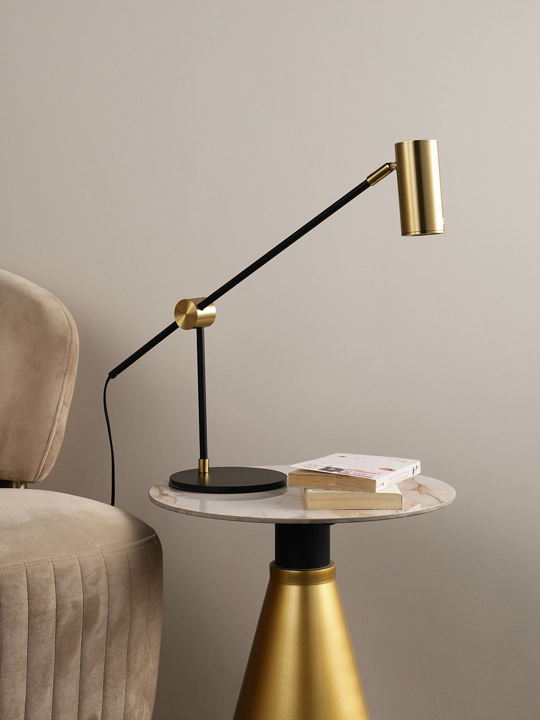 Angled table lamp casting a warm, ambient light