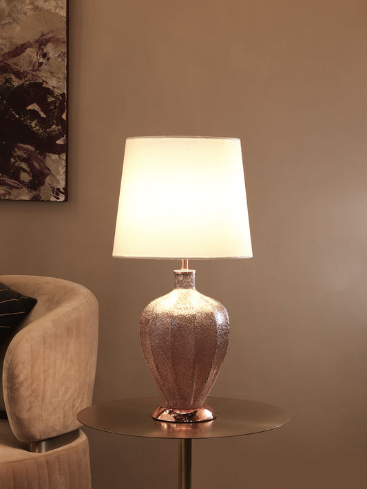 Rose gold table lamp with white fabric shade