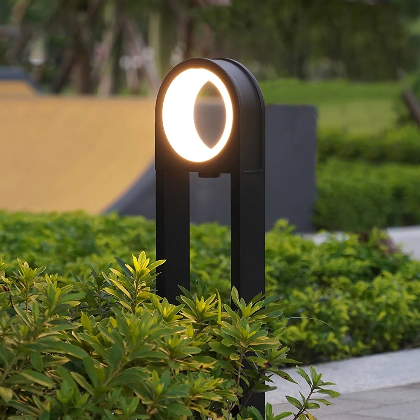 Eco-friendly LED Bollard Light illuminating architectural details