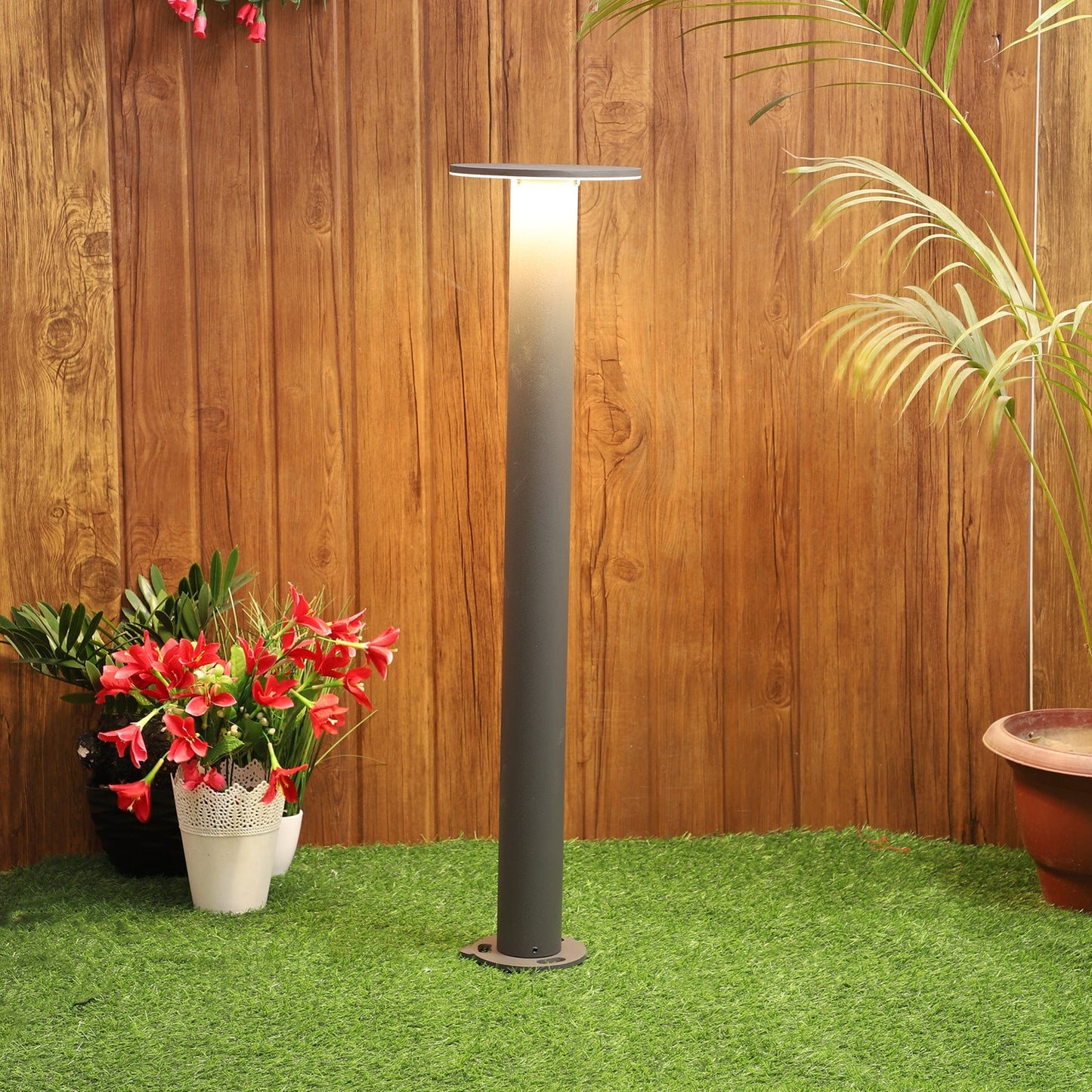 Scandinavian-inspired circular bollard garden light