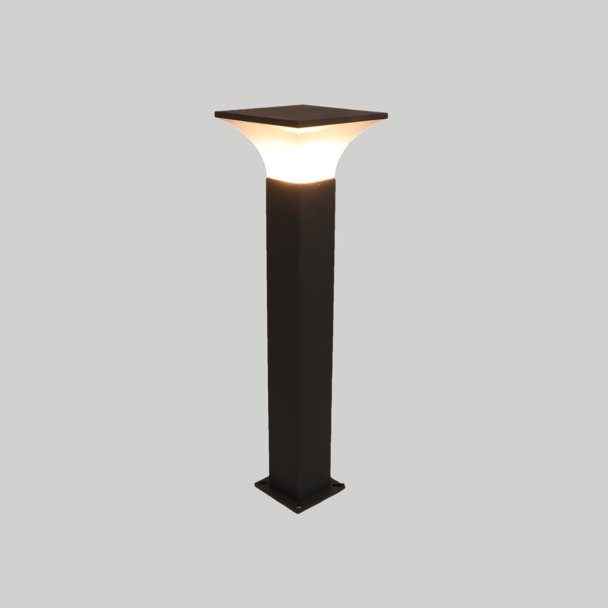 LED bollard light revealing intricate architectural details